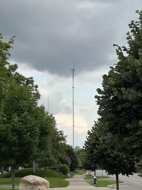 Towering above the grey skies.